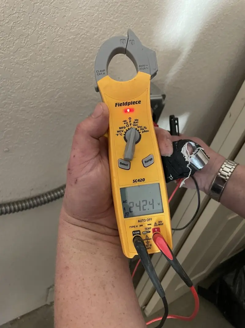 Voltage testing with clamp meter during Circuit Breaker Repair in Sandown